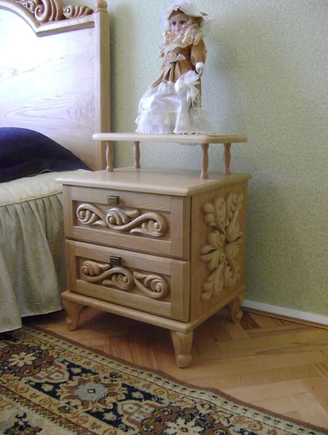 Carved bedside table